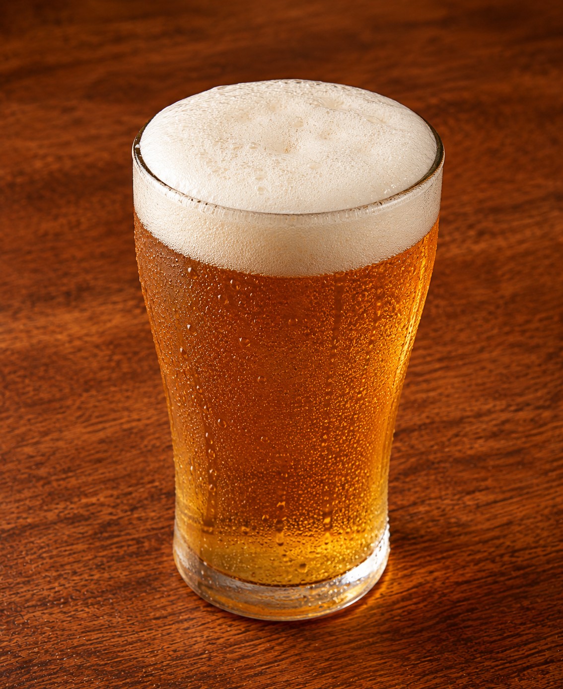 Ice-cold draft beer in a frosty glass
